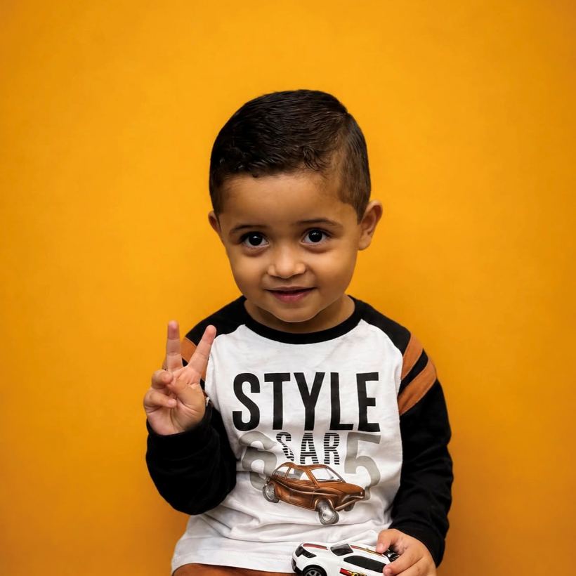 Criança com corte infantil feito na Barbearia 08